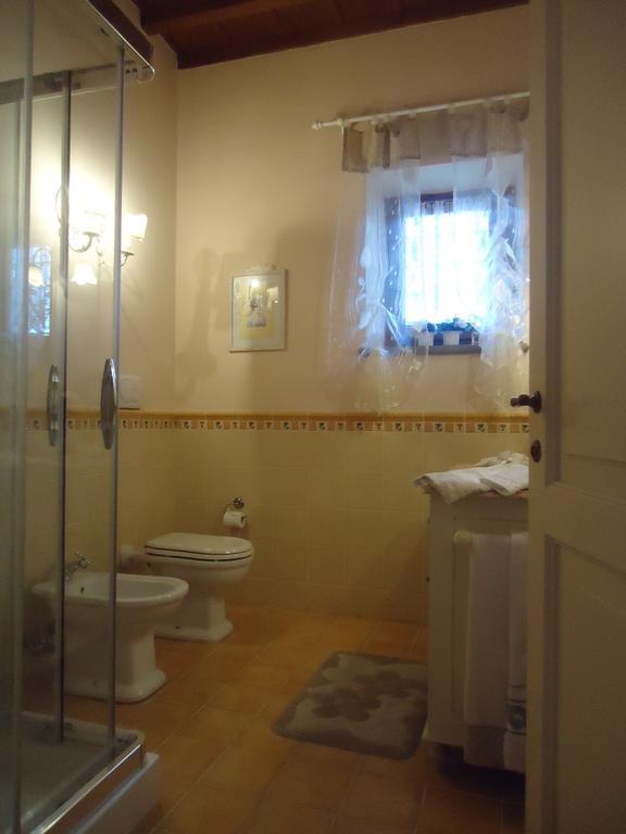 Suite "La Badia" Scandicci Szoba fotó